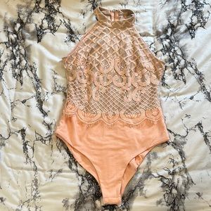 Pink and nude lace bodysuit